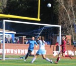 Ciera Berthiaume in position for a dangerous header