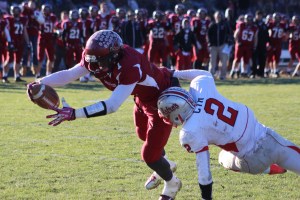 Seimou Smith lunges into the end zone after catching a pass from QB Rob Law late in the second quarter