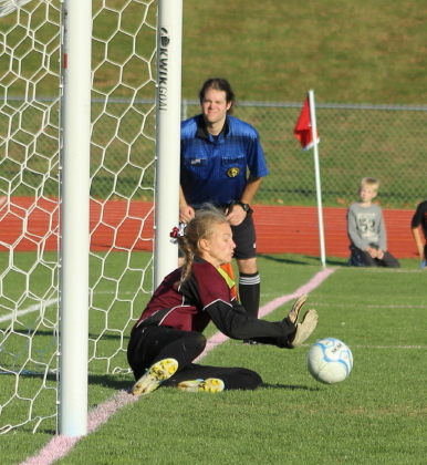 Liz Mycock blocks the penalty kick of Sam Sparda.