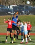 GK Sydney Martin out to clear away a threat