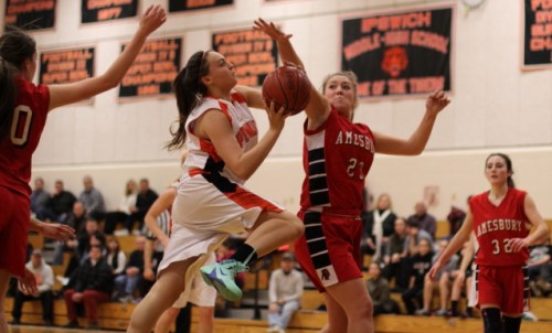 McKenzie Cloutier (23) tries to stop driving Abby McCarthy