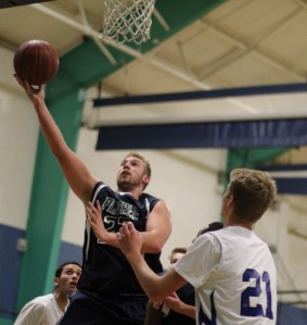 Kyle Lentini (13 points) gets a layup