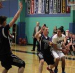 Thomas Lennon (11) defends Josh DuPont (3)