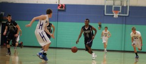 John Spears (4) leads a break