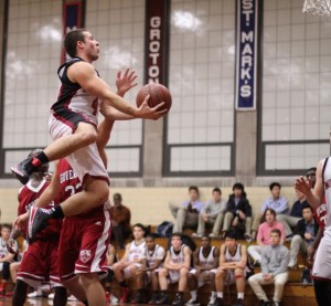 Aaron Swenson flies to the hoop for Middlesex