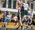 McKenna Kilian (23) goes for the block