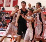 Pat Racy (12 points) draws heavy coverage