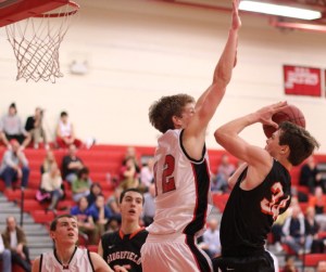 Ryan Fitzpatrick goes for the block on Charlie Irwin (12 points)