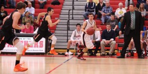 Masuk coach Tom Zultowski watches the action