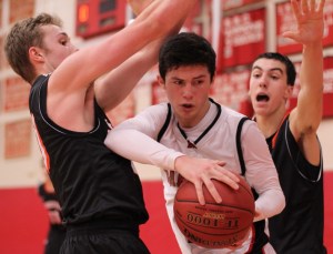 Bryan Acevedo gets caught in some tight Ridgefield defense