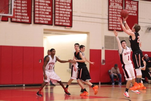 Matt Brennan (18 points) launches a three