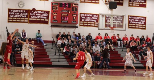 Joe Bertrand launches a late three to end the third quarter