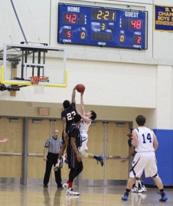 Jaqhawn Walters blocks the shot of Eric Houska