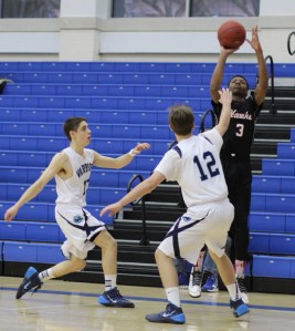 Micheal Gilliam (31 points) shoots from the corner