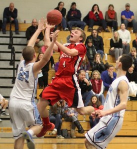 Pat Halloran (14 points) floats in the lane