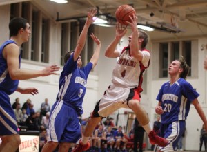 Pat Halloren tries to shoot over Ryan Slack