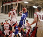 Ben Noelk (12 points) tries to shoot over Pat Scanlon