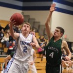 Jack Freed goes for a block against Cam Armand