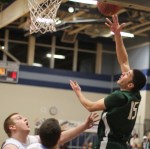 Sean Gutierrez (15 points) puts up a shot in the lane