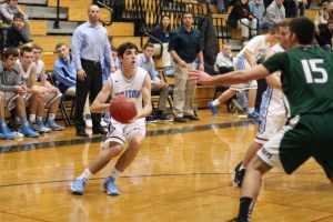 Kevin Clark (10 points) sets to shoot