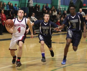 Aaron Swenson chased by Chad DiCenzo and Alonzo Jackson
