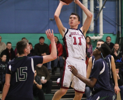 Austin Dorsey (23 points) shoots over Connor Reardon and Alonzo Jackson