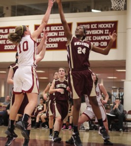 Emily Pettigrew (21 points) shoots over 6-3 Samnell Vonleh
