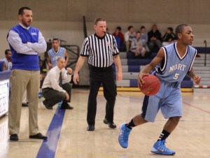 Winnacunnet coach Jay McKenna watches Ashea Bittle