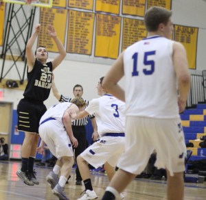 Will Menapace (15 points) launches a three