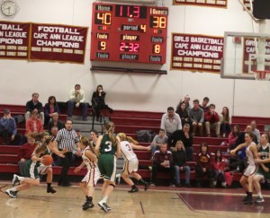 McKenna Kilian (15 points) starts her drive for the tying basket in regulation