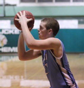 Corey Parsons (14 points) lines up a three
