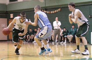 Ryan Kuchar tries to drive on Jack Germinara