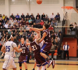 Aaron Croce goes for the block