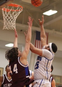 Devan Harris shoots over Justin Wagner