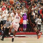 Kelven Perpetuo tries a layup