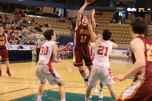 Ryan Roach (14 points) hits a last-minute runner in the lane