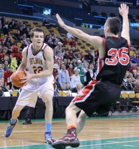 Rory Donovan (15 points) looks for an opening