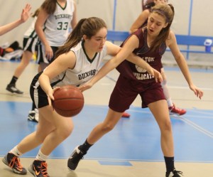 Katie Dodos reaches in on Olivia Duvall