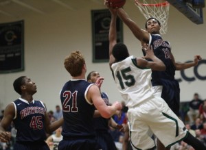 Isaac Copeland goes for the block on Aubrey Dawkins