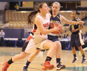 Fallon Field drives on Sophia Holmes