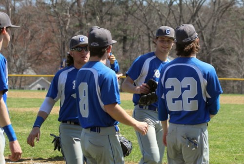 Pat Slack and teammates celebrate his two-hit shutout