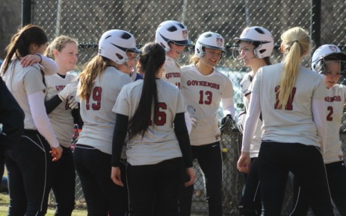All smiles around Courtney Cashman after her grand slam in the fifth inning.