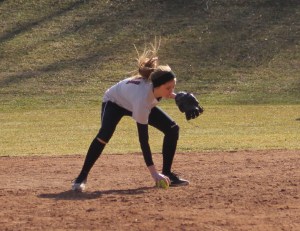 freshman Chloe Quigley fields a grounder