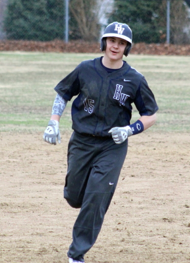 Austin Michel is in the home run trot after a long blast in the 8th inning