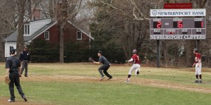 Scott Webster hustles to beat a throw to first