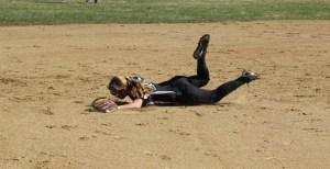 Shortstop Kassidy Kennefick dives for a grounder