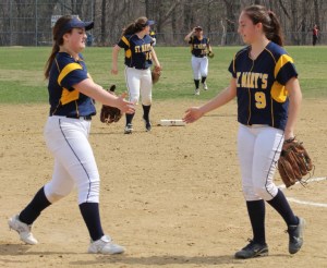 Pitcher Mia Nowicki gets congratulated by teammate Katie Terban 