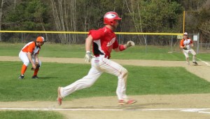 Ben Cullen gets the first Amesbury run on an infield out