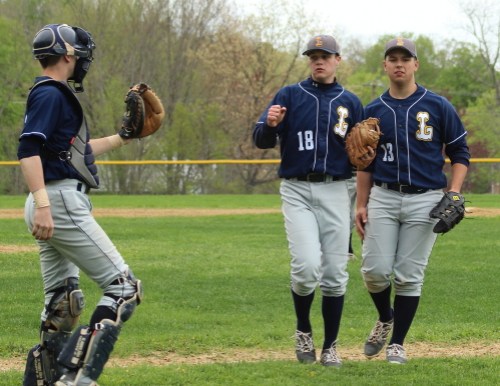 Winning pitcher Greg Basilesco (#18) after the game
