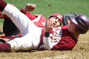 Ryan Furlong and catcher Mac Short collide at the plate